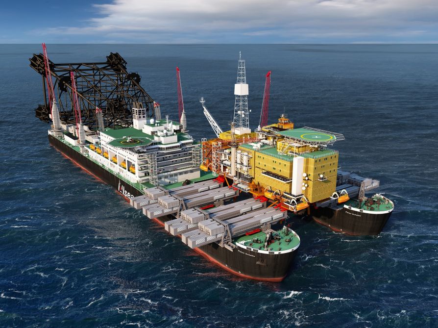 Корабль Pioneering Spirit перевозит буровую платформу